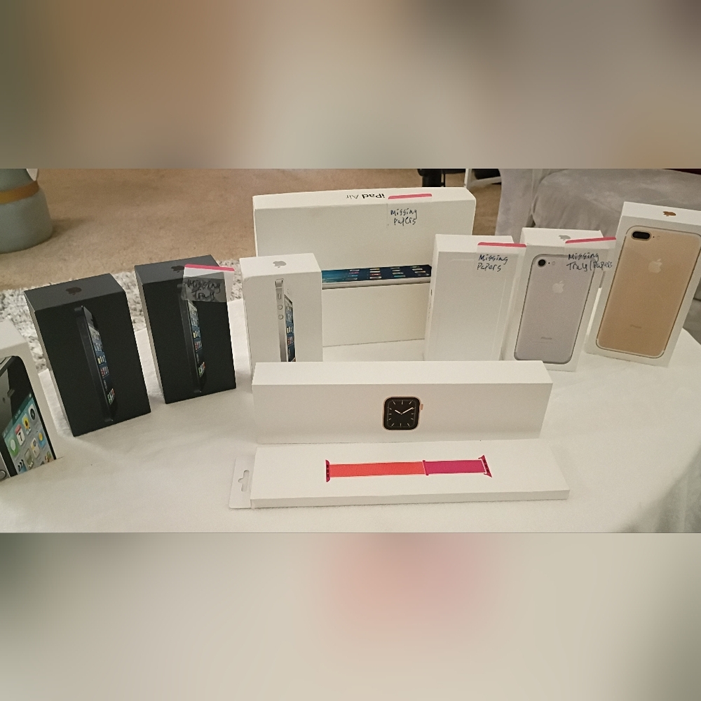 9 empty iPhone, iPad air and Apple watch boxes